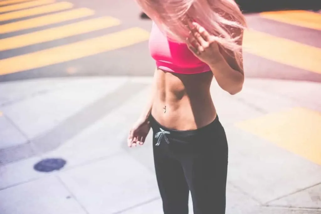 Woman with toned stomach after LA-EMS Body Sculpting Treatment Taunton 